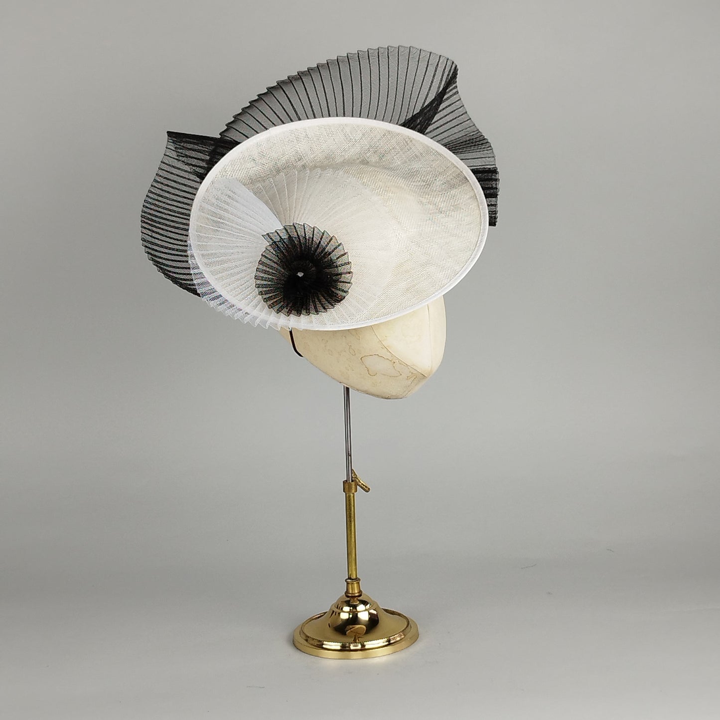 Black and White hatinator with pleated crinoline swirls, perfect for making a bold statement at Royal Ascot or weddings.