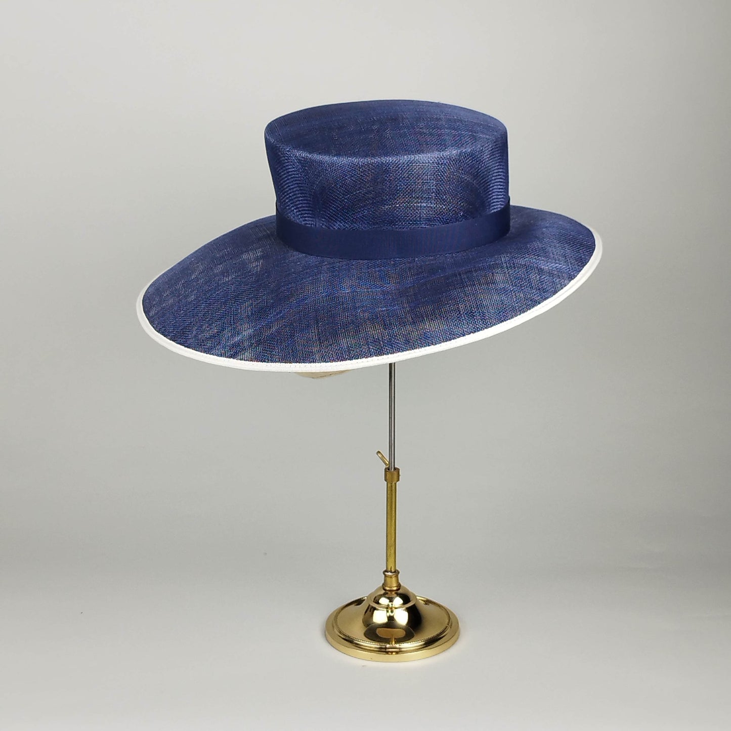 Traditional Navy wide brim hat with ivory binding and classic crown