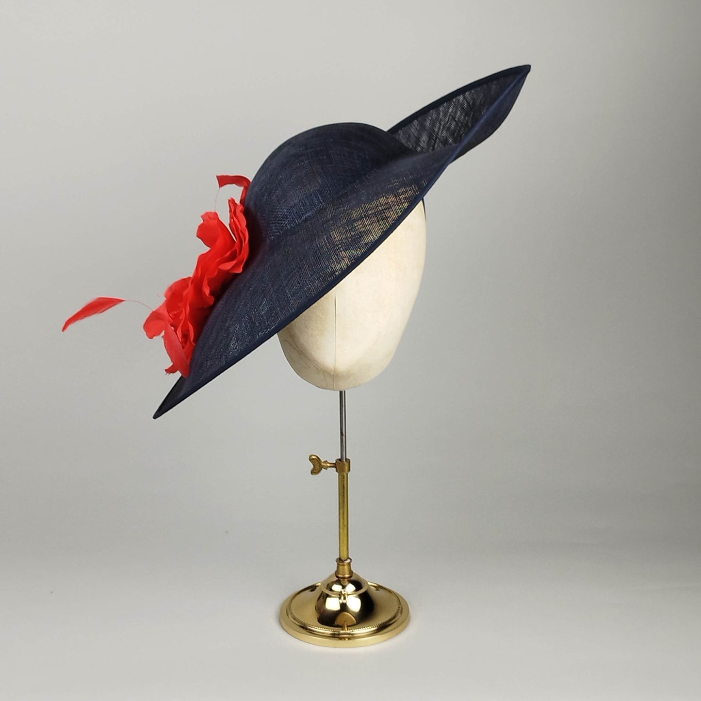 Navy hatinator with red flower
