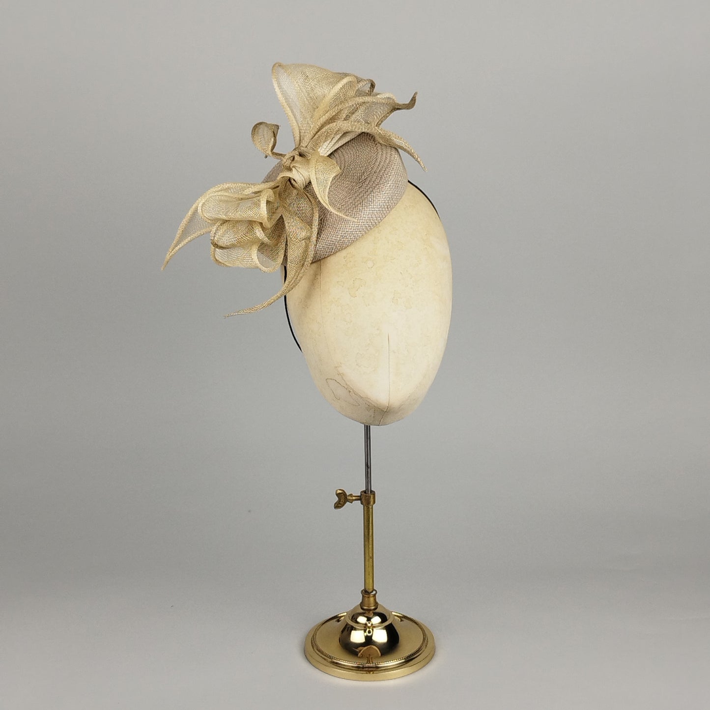 Taupe straw pillbox hat with bow
