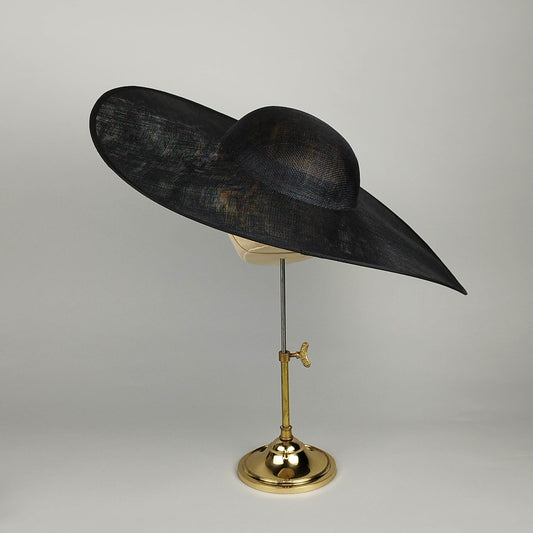 Minimal black wide brim hat with subtle upward sweep