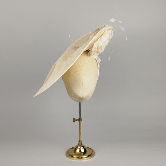 Large cream lace hatinator with silk roses and sculptural details