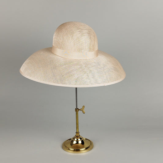 Pale pink wedding hat with Dior-inspired 1950s shape. Perfect for vintage or modern looks. Personalize with your favorite embellishments. A classic hat that suits a variety of occasions.