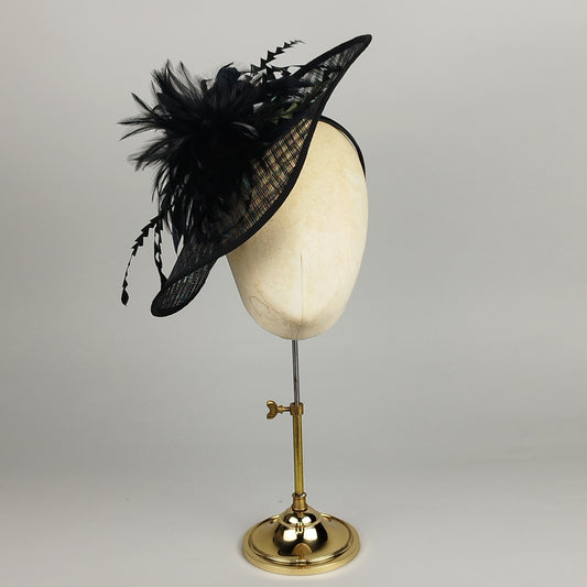 Black fascinator with basketweave sinamay and layered feathers for a bold, textured look