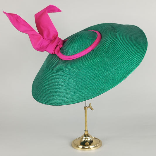 Emerald green wide brim hat with hot pink silk scarf, perfect for adding a fun, vintage-inspired touch to weddings or Ascot.